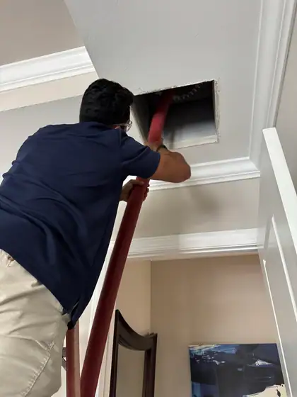 Duct cleaning through a ceiling access