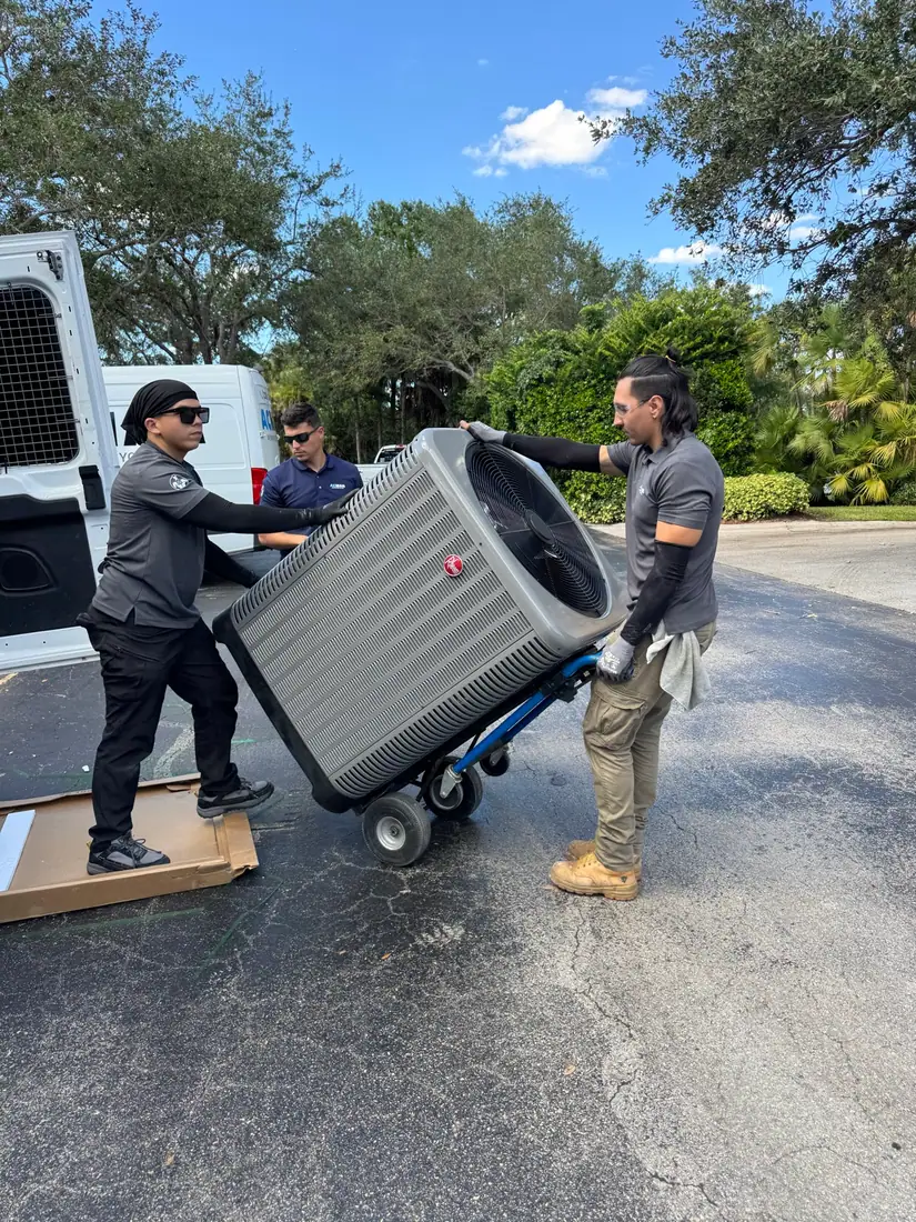 Moving a new condenser into place