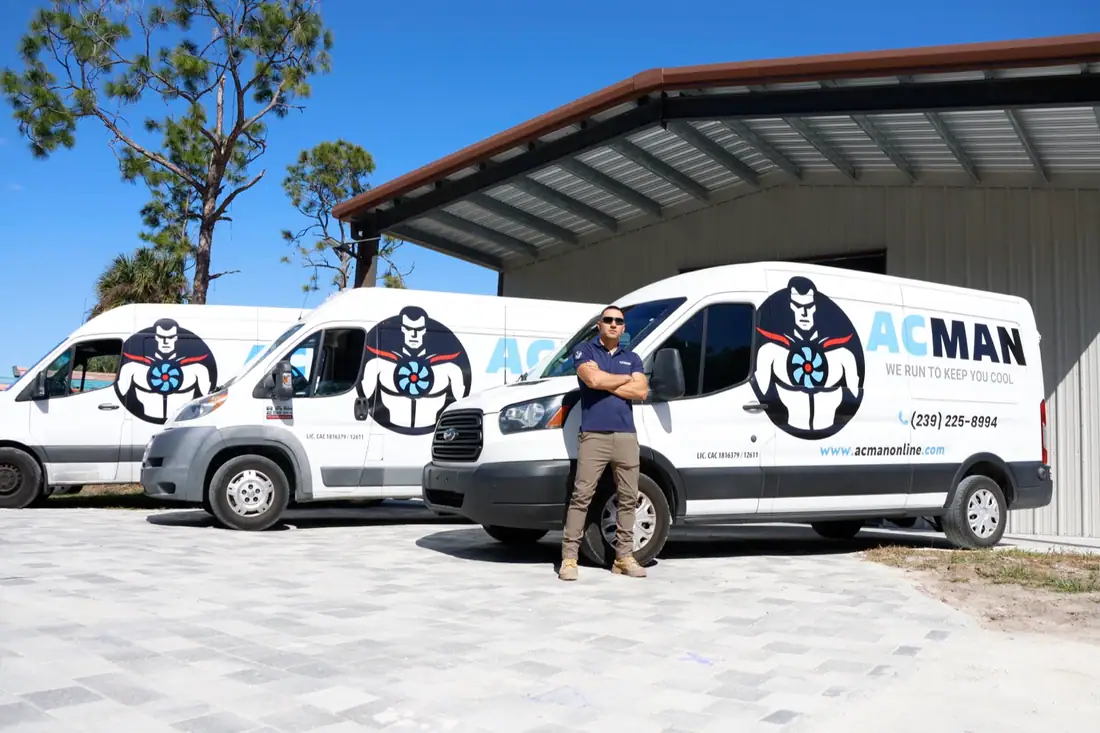 ACMAN vans parked at the shop