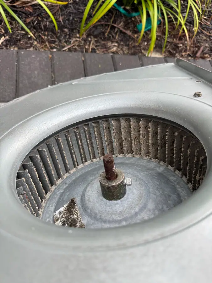 A dirty blower wheel before cleaning